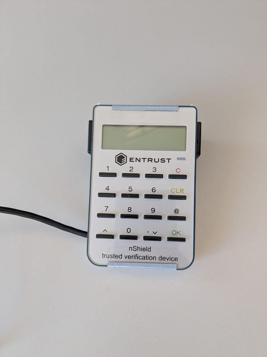 Entrust nShield Trusted Verification Device, a small white card reader with a numeric keypad