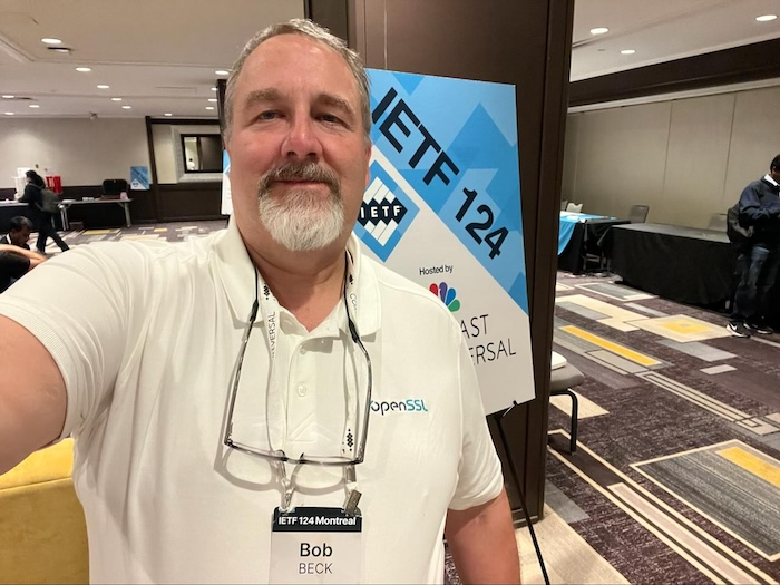OpenSSL engineer Bob Beck at the IETF 124 sign in Montreal